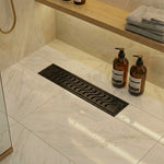 Load image into Gallery viewer, Matte Black Wave 304 Grade Shower Drain Channel 12x4 Inch with Cockroach Trap – by Specule